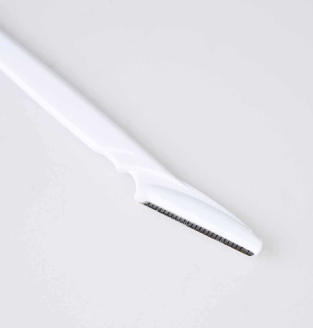 Kulmakarvaveitsi valkoinen - 2